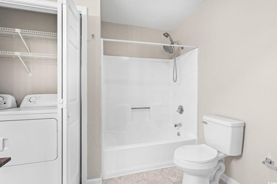 This charming three-bedroom, two-bathroom patio home is located - photo 29
