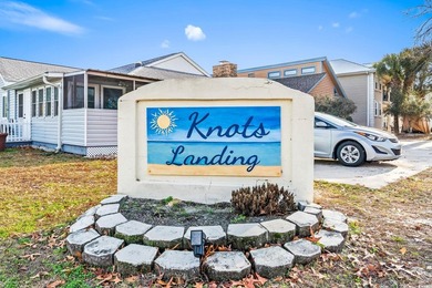 This charming three-bedroom, two-bathroom patio home is located - photo 33