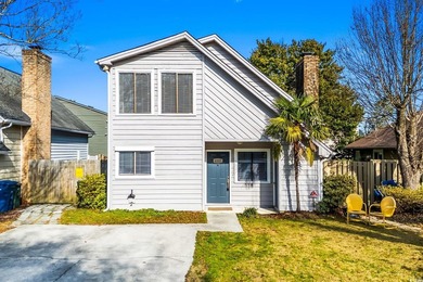 This charming three-bedroom, two-bathroom patio home is located - photo 34