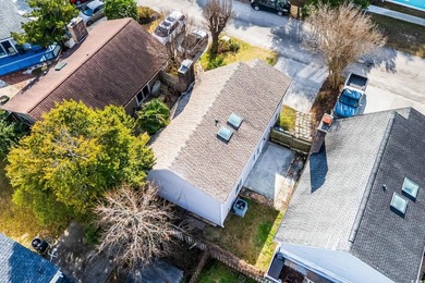 This charming three-bedroom, two-bathroom patio home is located - photo 35