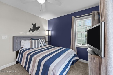 This meticulously maintained four-bedroom, three-bath waterfront