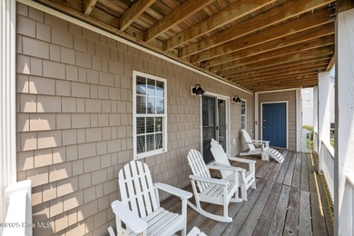 This meticulously maintained four-bedroom, three-bath waterfront