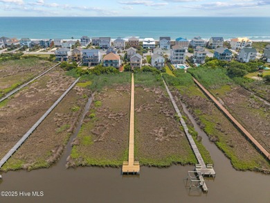 This meticulously maintained four-bedroom, three-bath waterfront