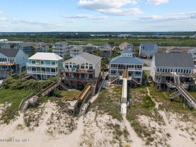 This meticulously maintained four-bedroom, three-bath waterfront