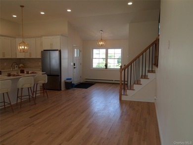 Fall in love with this Fully Renovated Split! 13ft cathedral - photo 10