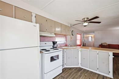 This home is located in the 55+ Resident Owned community of - photo 9