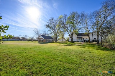Set back from the road on 2.607 acres, this property offers a
