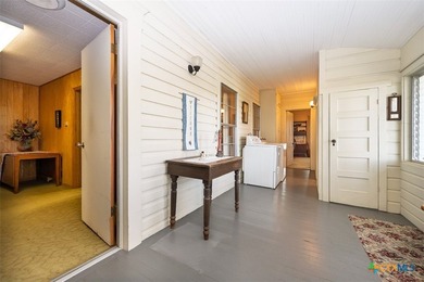 Set back from the road on 2.607 acres, this property offers a