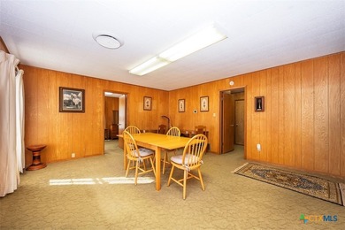 Set back from the road on 2.607 acres, this property offers a