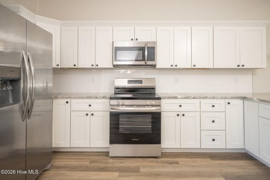 New construction home featuring 3 bedrooms and 2 bathrooms with - photo 11