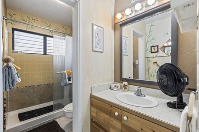 Welcome to Kihei Resort #105, a charming ground-floor condo in a - photo 9
