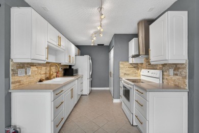 Lake Home For Sale in West Palm Beach, Florida
