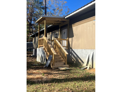 This 1975 MH is being totally remodeled. New floors, ac/htg unit - photo 2
