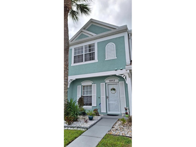 Welcome to this beautifully maintained Key West-style townhome - photo 2