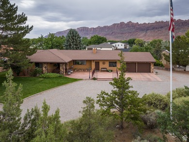 A truly rare opportunity to own one of Moab's most desirable - photo 3