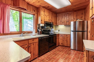 This well built home has a living/dining room combination with a - photo 9