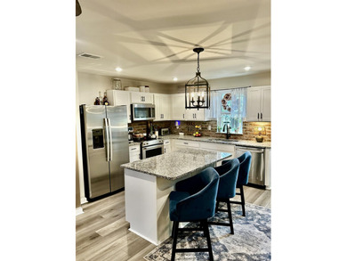 Welcome to this beautifully FHA/VA approved upgraded townhome - photo 4