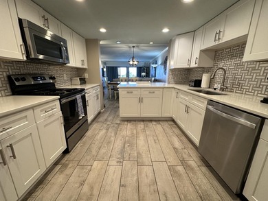 Spacious two bedroom/two bath condo, located on the 2nd floor of - photo 2