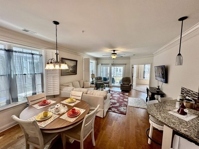 Welcome to this elegant three-bedroom, two-bathroom condominium - photo 3