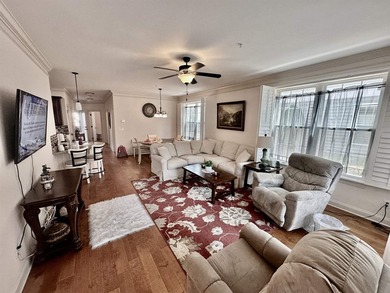 Welcome to this elegant three-bedroom, two-bathroom condominium - photo 4