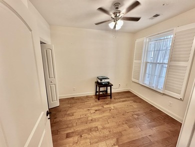 Welcome to this elegant three-bedroom, two-bathroom condominium - photo 8