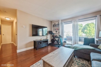 WELCOME HOME TO THIS BEAUTIFUL LIGHT AND BRIGHT RENOVATED CO-OP