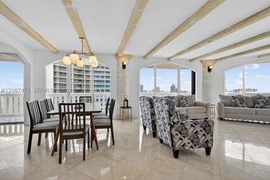 SPECTACULAR VIEWS TO THE INTRACOASTAL AND OCEAN FROM THIS BRIGHT - photo 3