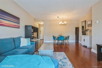 WELCOME HOME TO THIS BEAUTIFUL LIGHT AND BRIGHT RENOVATED CO-OP