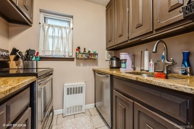 WELCOME HOME TO THIS BEAUTIFUL LIGHT AND BRIGHT RENOVATED CO-OP