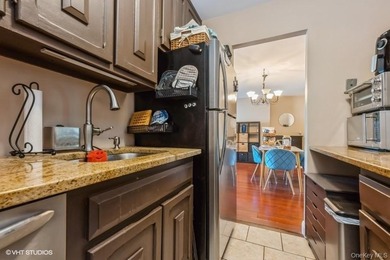 WELCOME HOME TO THIS BEAUTIFUL LIGHT AND BRIGHT RENOVATED CO-OP