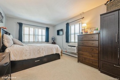 WELCOME HOME TO THIS BEAUTIFUL LIGHT AND BRIGHT RENOVATED CO-OP