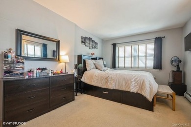 WELCOME HOME TO THIS BEAUTIFUL LIGHT AND BRIGHT RENOVATED CO-OP