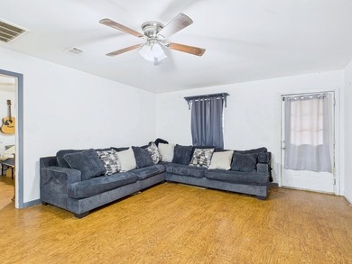 Move-in ready and priced to sell! This 4-bedroom, 2-bath home in - photo 4