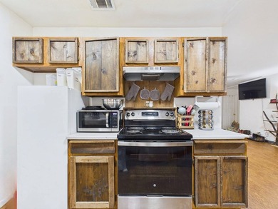 Move-in ready and priced to sell! This 4-bedroom, 2-bath home in - photo 8