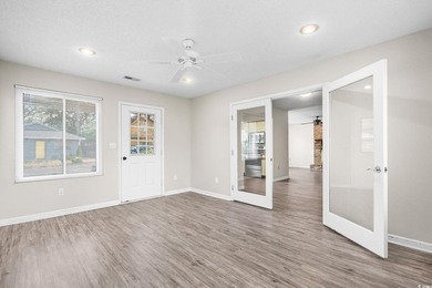 Live just half a mile from the beach, this charming patio home - photo 17