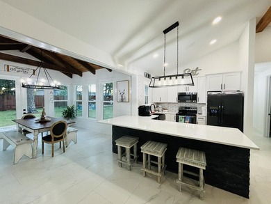 Discover the perfect blend of coastal charm and modern luxury at - photo 4