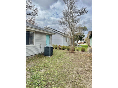 Live just half a mile from the beach, this charming patio home - photo 32