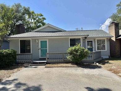 Live just half a mile from the beach, this charming patio home - photo 37