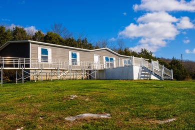 Discover this spacious 5-bedroom, 3-bath Clayton home on 15.4