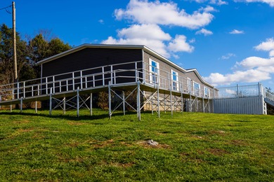 Discover this spacious 5-bedroom, 3-bath Clayton home on 15.4