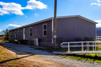 Discover this spacious 5-bedroom, 3-bath Clayton home on 15.4