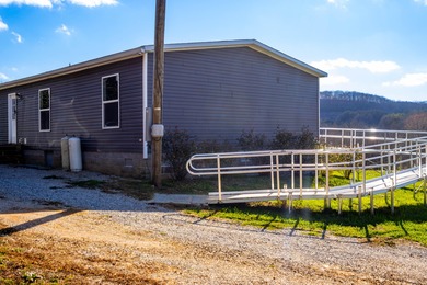 Discover this spacious 5-bedroom, 3-bath Clayton home on 15.4