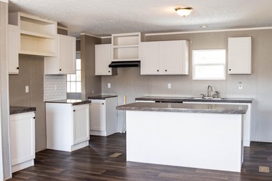 Discover this spacious 5-bedroom, 3-bath Clayton home on 15.4