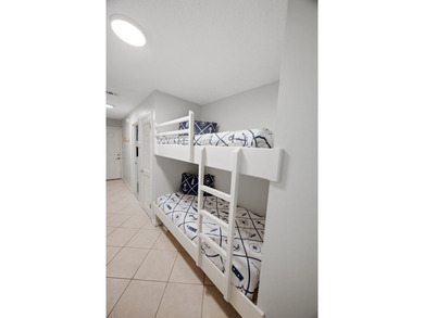 Welcome to this charming ground floor Gulfview condo. Such - photo 10