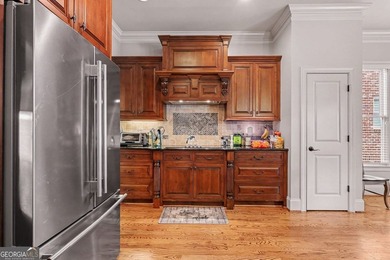 Welcome to this stunning 6-bedroom, 4-bathroom home located in a - photo 7