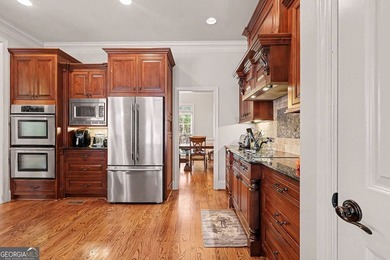 Welcome to this stunning 6-bedroom, 4-bathroom home located in a - photo 8