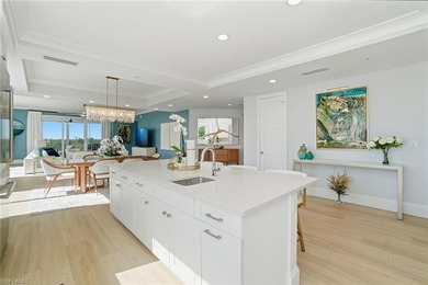 Welcome to an expansive fourth-floor residence in Seaglass at