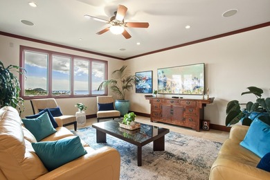 Welcome to this stunning top-floor oceanfront residence in the - photo 5