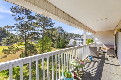Discover this beautifully updated 3-bedroom, 2-bath condo in - photo 7