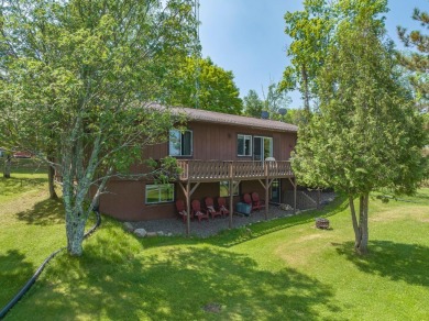 Located on Thousand Island Lake of the famous Cisco Chain of - Lake Home For Sale in Watersmeet, Michigan
